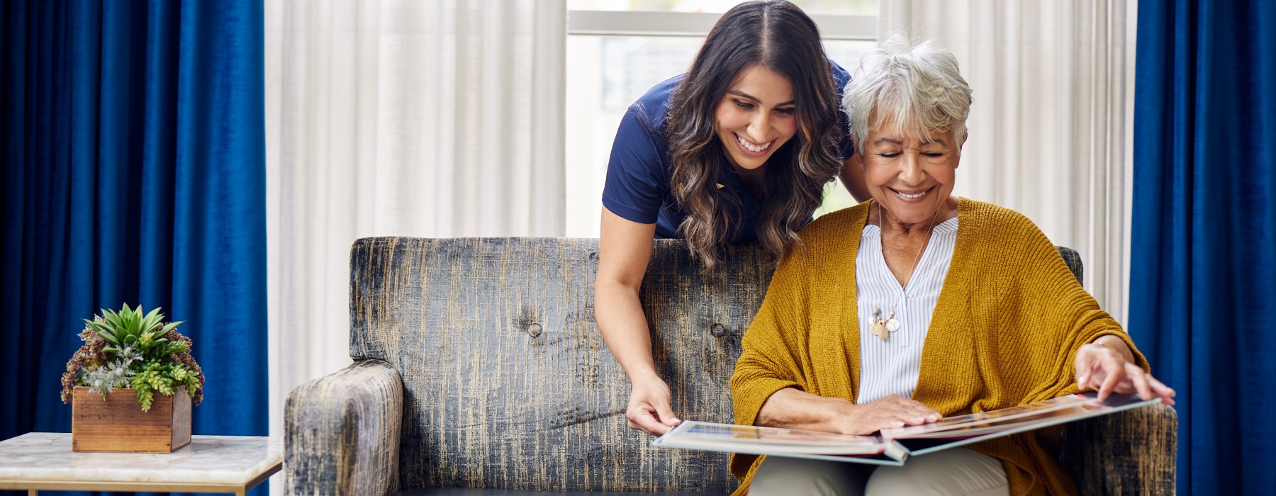 team member helping resident with care